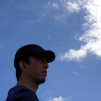 春日井良隆氏