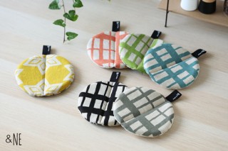 エヌ・エレファント、三角鍋よりしっかりつかめる「まんまる鍋つかみ」を発売